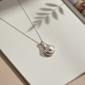 Artisanal Liquid-Metal & Baroque Pearl Pendant